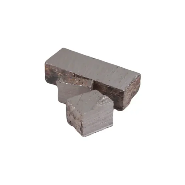 A rough, silvery bismuth crystal with geometric shapes.